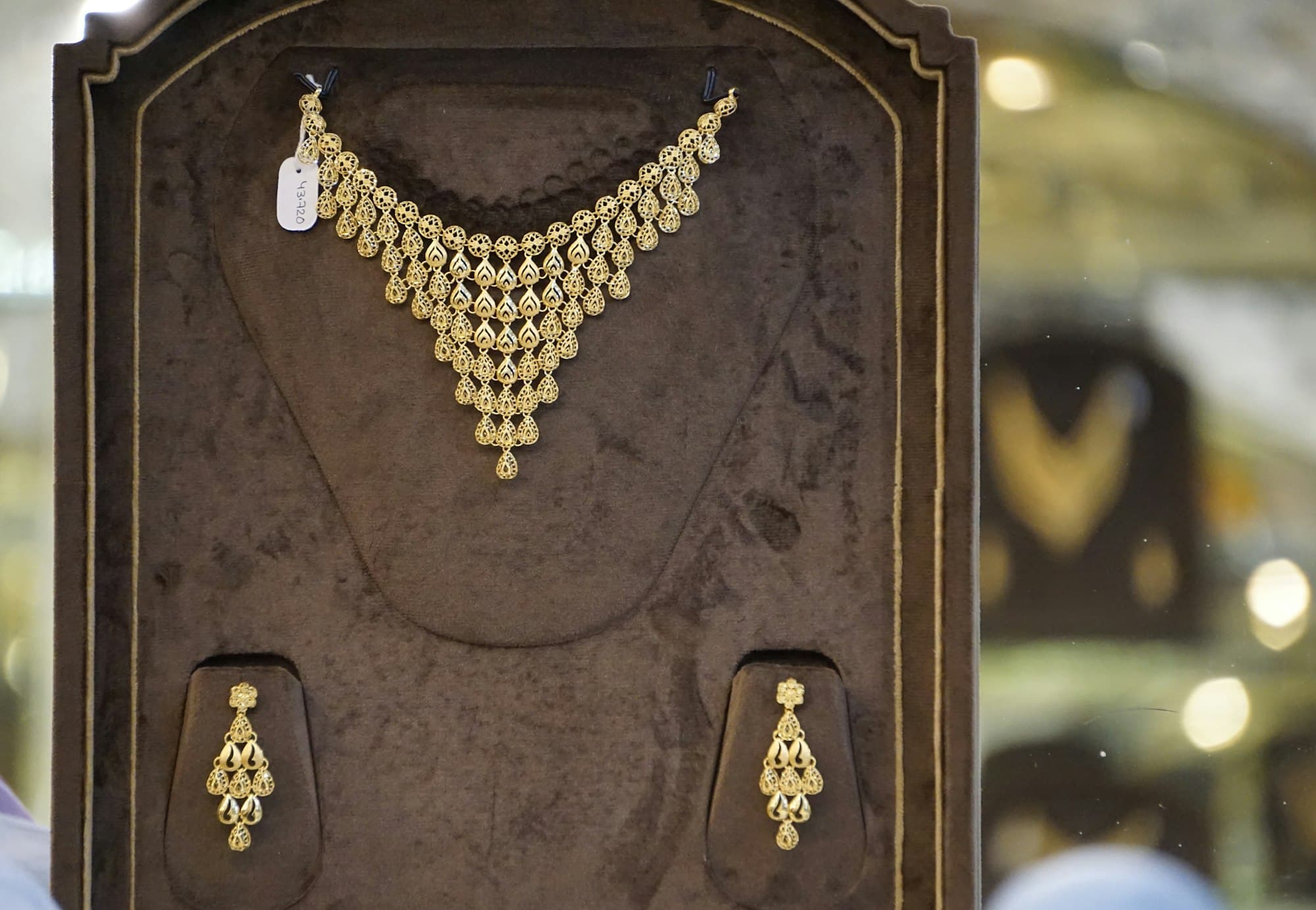 Gold necklace and earrings